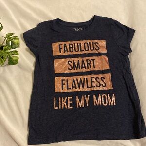 Girls gray top with gold/black logo in size M 7/8